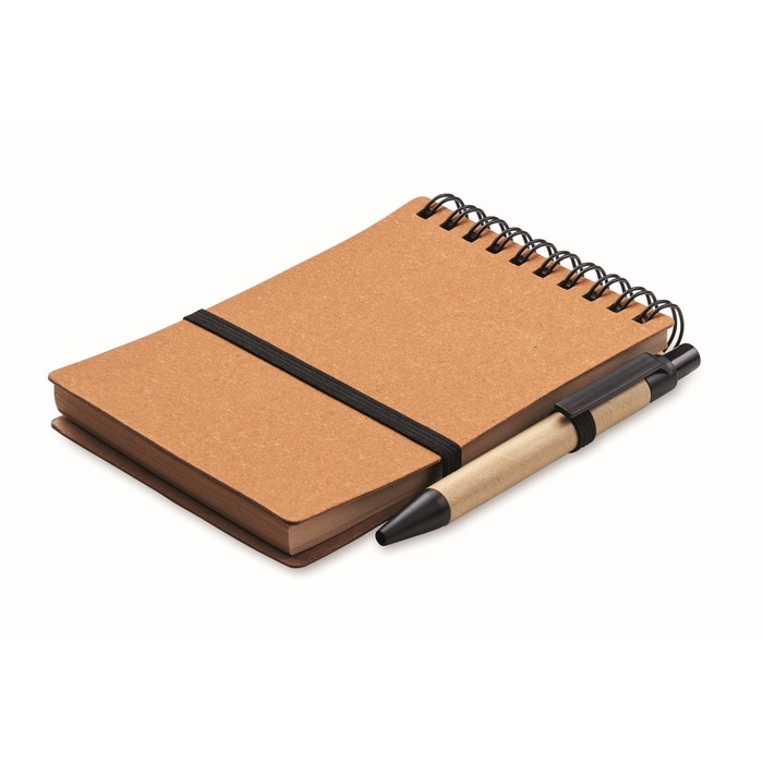 Notebook with blue ink pen and elastic band, lined pages