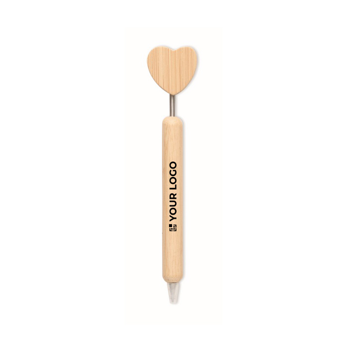 Bamboo pen with heart-shaped detail and blue ink