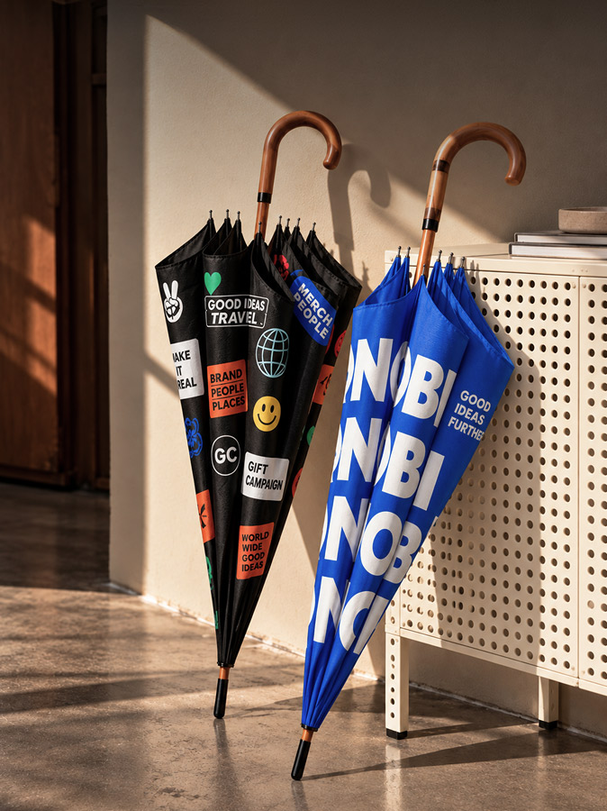 Black and blue branded umbrellas with printed logos and designs