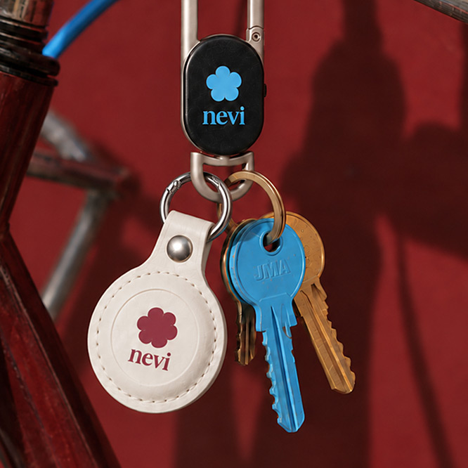 Branded key finders and trackers attached to a set of keys